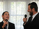 Chazan Braun singing with his son